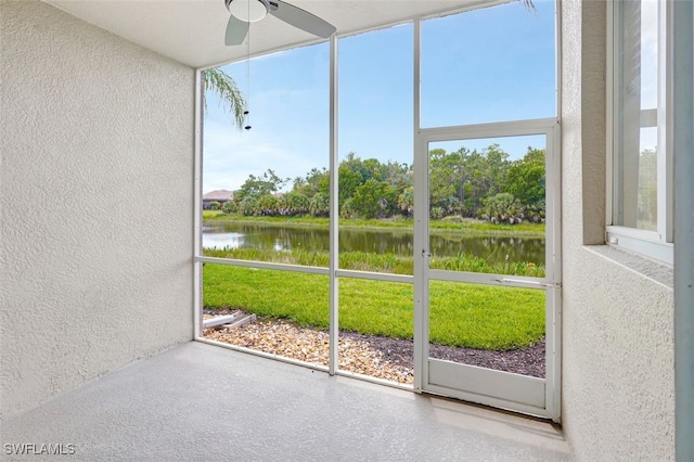 20010 Barletta Ln Unit 612, Estero, FL 33928 - unfurnished sunroom with a water view, a ceiling fan, and healthy amount of natural light