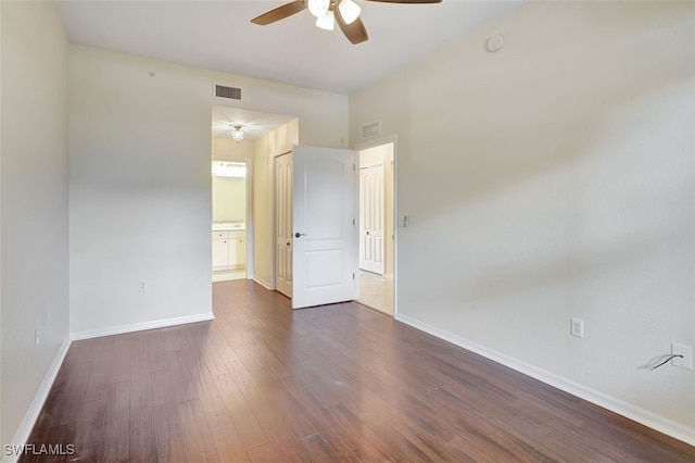 20010 Barletta Ln Unit 612, Estero, FL 33928 - empty room with a ceiling fan, dark wood-style floors, and a smoke detector