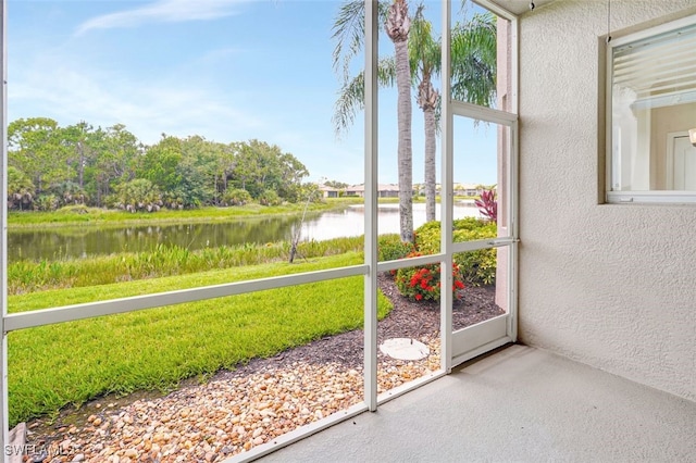 20010 Barletta Ln Unit 612, Estero, FL 33928 - unfurnished sunroom with a water view and healthy amount of natural light