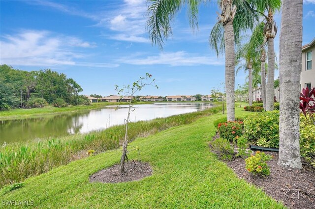 20010 Barletta Ln Unit 612, Estero, FL 33928 - view of green lawn featuring a water view