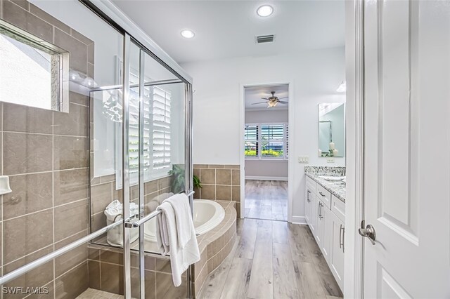 13461 Sabal Pointe Dr, Fort Myers, FL 33905 - full bath featuring a shower stall, vanity, a bath, ceiling fan, and recessed lighting