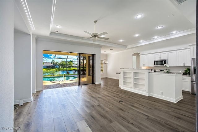 13461 Sabal Pointe Dr, Fort Myers, FL 33905 - unfurnished living room featuring ornamental molding, a ceiling fan, a raised ceiling, dark wood finished floors, and recessed lighting