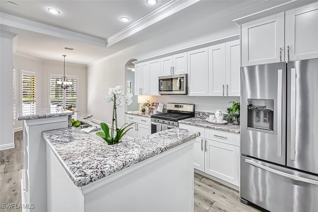 13461 Sabal Pointe Dr, Fort Myers, FL 33905 - kitchen with stainless steel appliances, light wood-type flooring, an island with sink, ornamental molding, and recessed lighting