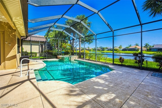 13461 Sabal Pointe Dr, Fort Myers, FL 33905 - view of pool featuring a patio, a water view, a lanai, and a pool with connected hot tub