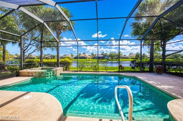 13461 Sabal Pointe Dr, Fort Myers, FL 33905 - view of swimming pool featuring a patio, a water view, glass enclosure, and a pool with connected hot tub