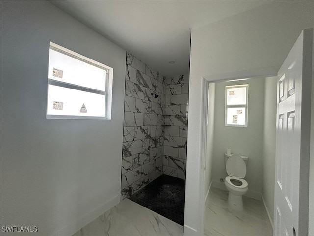 1402 Henry Ave, Lehigh Acres, FL 33972 - full bathroom featuring marble look tile flooring and a marble finish shower
