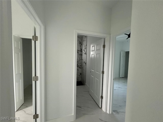 1402 Henry Ave, Lehigh Acres, FL 33972 - hall featuring light marble finish flooring