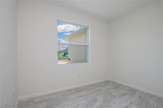 311 Rand Ave, Lehigh Acres, FL 33974 - unfurnished room with baseboards