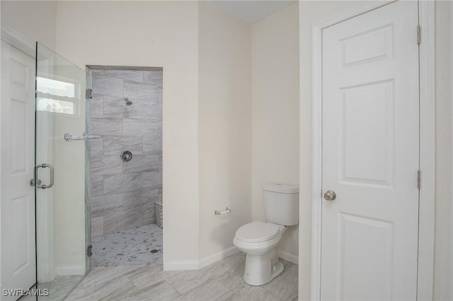 311 Rand Ave, Lehigh Acres, FL 33974 - bathroom with a shower stall and toilet
