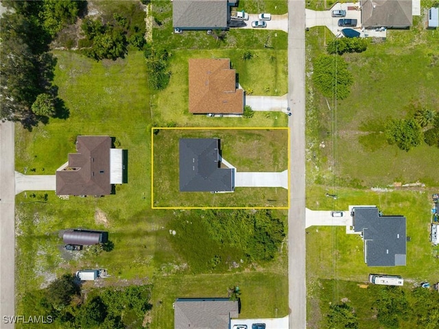 311 Rand Ave, Lehigh Acres, FL 33974 - aerial view of property and surrounding area featuring property boundaries highlighted