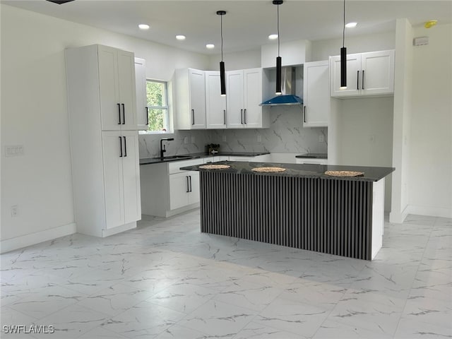 4204 E 24th St, Alva, FL 33920 - kitchen featuring wall chimney range hood, recessed lighting, dark countertops, backsplash, and a kitchen island
