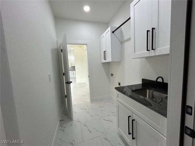 4204 E 24th St, Alva, FL 33920 - laundry room featuring hookup for an electric dryer, cabinet space, light marble finish floors, and recessed lighting