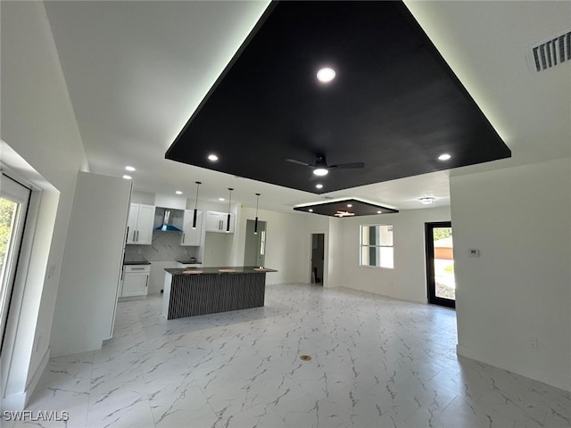 4204 E 24th St, Alva, FL 33920 - unfurnished living room featuring light marble finish floors, a ceiling fan, and recessed lighting
