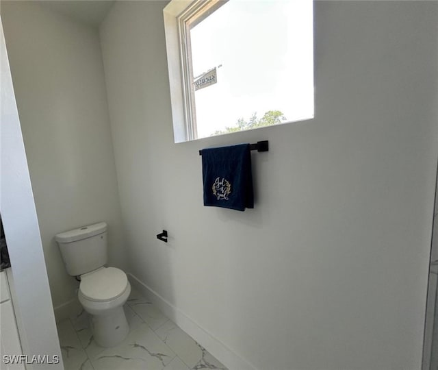 4204 E 24th St, Alva, FL 33920 - bathroom with toilet and marble finish floors