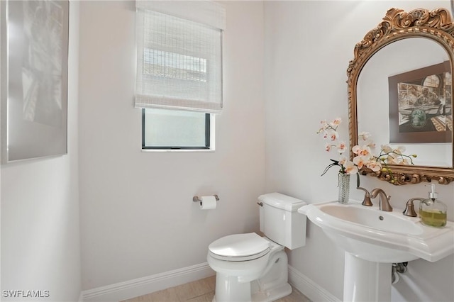 23484 Sanabria Loop, Bonita Springs, FL 34135 - bathroom featuring toilet and baseboards
