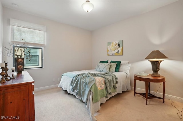 23484 Sanabria Loop, Bonita Springs, FL 34135 - bedroom featuring light colored carpet and baseboards