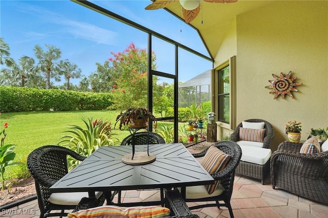 23484 Sanabria Loop, Bonita Springs, FL 34135 - sunroom / solarium with a ceiling fan and outdoor dining space