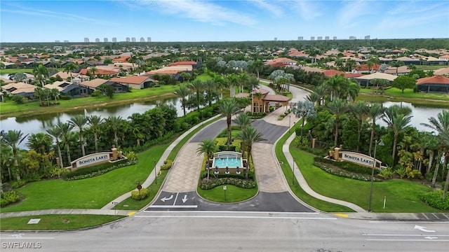 23484 Sanabria Loop, Bonita Springs, FL 34135 - aerial perspective of suburban area featuring a large body of water and city skyline