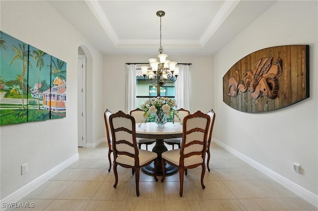 23484 Sanabria Loop, Bonita Springs, FL 34135 - dining area with a chandelier, arched walkways, and a raised ceiling