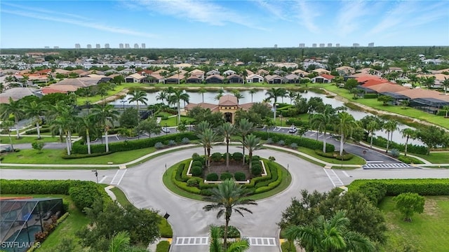 23484 Sanabria Loop, Bonita Springs, FL 34135 - aerial view of residential area with a nearby body of water and city skyline