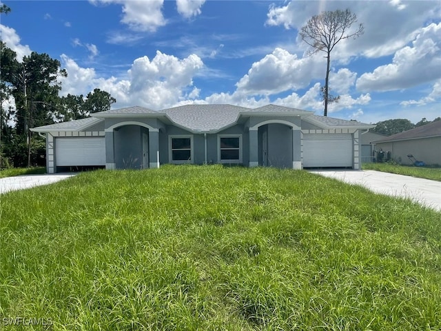 4605/4607 30th St SW, Lehigh Acres, FL 33973 - ranch-style house with stucco siding and a garage