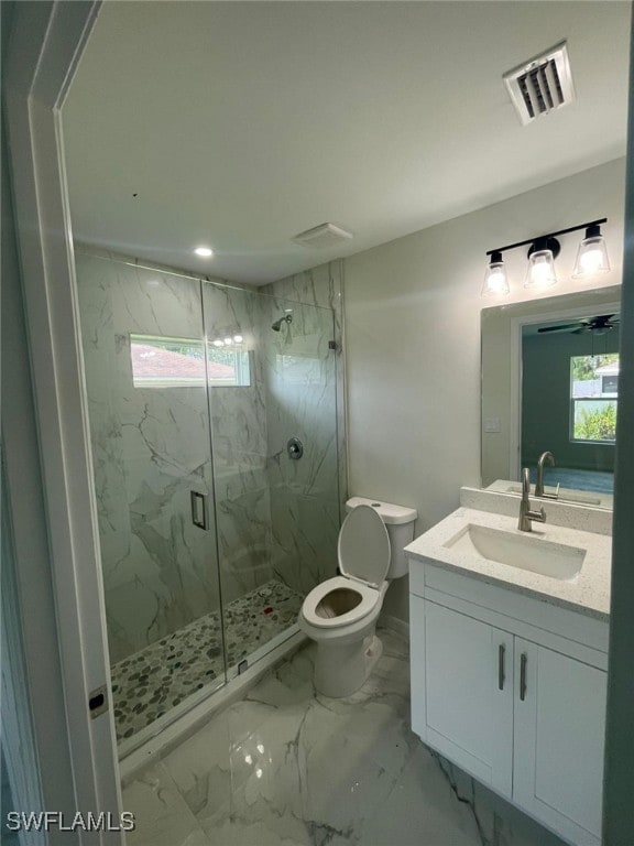 4605/4607 30th St SW, Lehigh Acres, FL 33973 - bathroom featuring a marble finish shower, vanity, and marble finish flooring