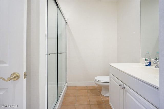 922 Turtle Ct Unit 21-21, Naples, FL 34108 - bathroom with vanity, a shower with shower door, and tile patterned flooring