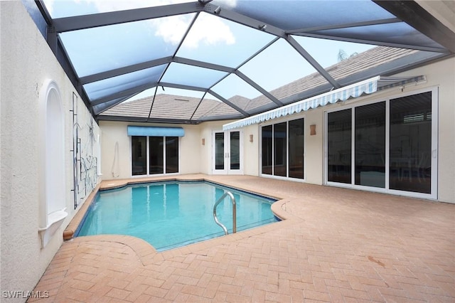 922 Turtle Ct Unit 21-21, Naples, FL 34108 - outdoor pool featuring a patio area, french doors, and glass enclosure