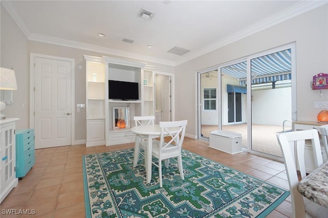 922 Turtle Ct Unit 21-21, Naples, FL 34108 - dining room with light tile patterned flooring and ornamental molding