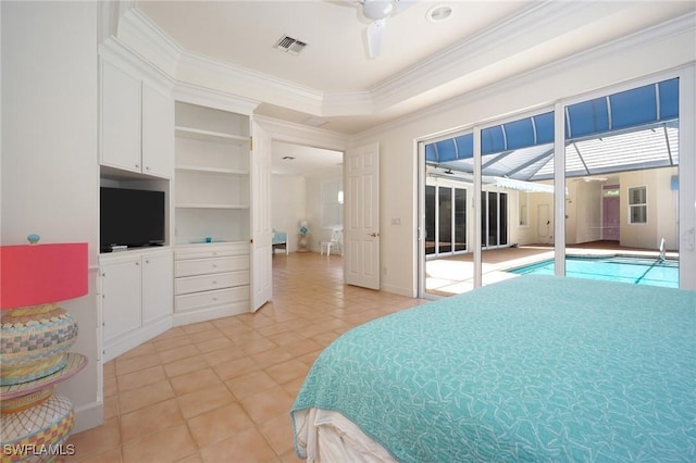 922 Turtle Ct Unit 21-21, Naples, FL 34108 - bedroom with ornamental molding, light tile patterned floors, and a tray ceiling