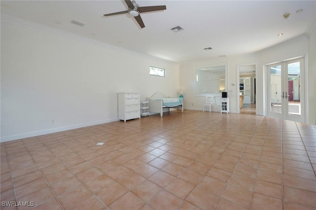 922 Turtle Ct Unit 21-21, Naples, FL 34108 - empty room featuring crown molding, plenty of natural light, light tile patterned flooring, a ceiling fan, and french doors