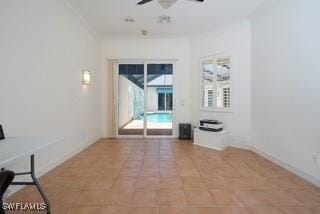 922 Turtle Ct Unit 21-21, Naples, FL 34108 - empty room with a ceiling fan and light tile patterned floors