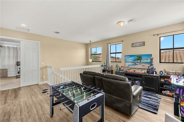 5158 Roma St, Ave Maria, FL 34142 - living room featuring wood finished floors