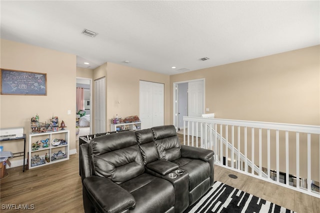 5158 Roma St, Ave Maria, FL 34142 - living room featuring wood finished floors and recessed lighting