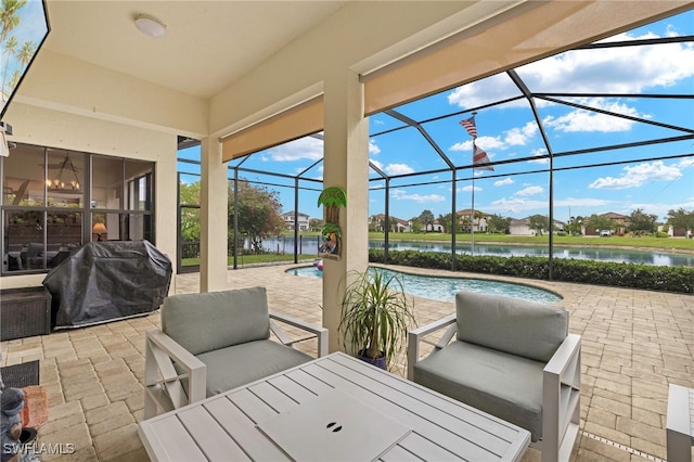 5158 Roma St, Ave Maria, FL 34142 - view of patio featuring a water view, an outdoor pool, area for grilling, and an outdoor living space