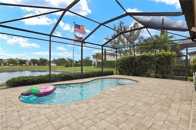 5158 Roma St, Ave Maria, FL 34142 - outdoor pool featuring a patio, a water view, and glass enclosure