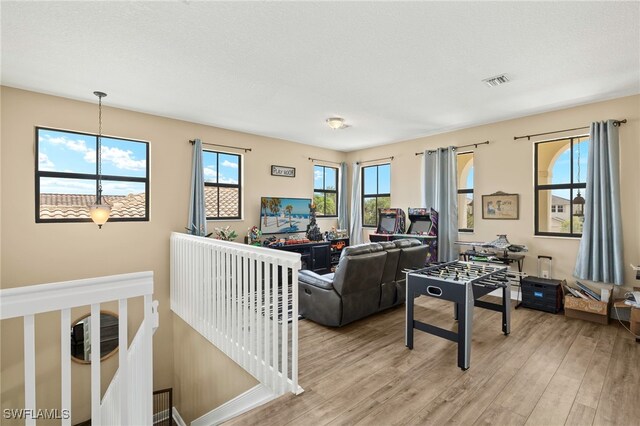 5158 Roma St, Ave Maria, FL 34142 - living area with light wood-style floors