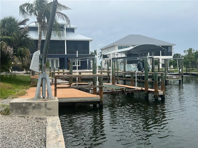 3 Palmview Blvd, Fort Myers Beach, FL 33931 - dock area featuring boat lift and a water view