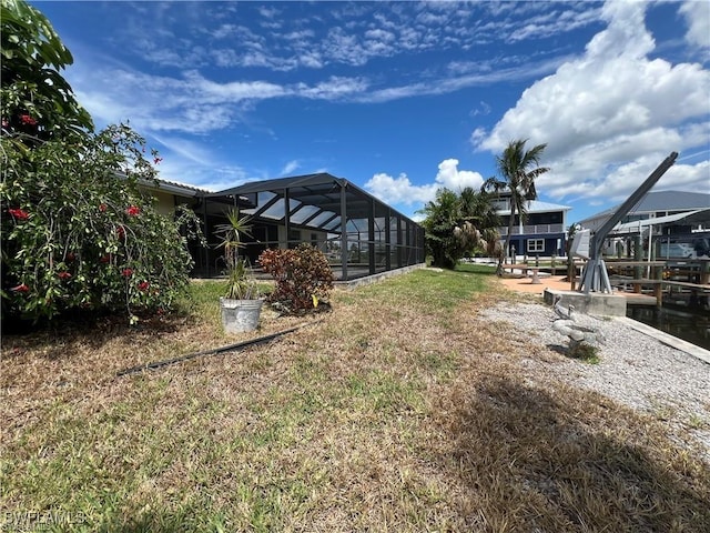 3 Palmview Blvd, Fort Myers Beach, FL 33931 - view of green lawn with a lanai
