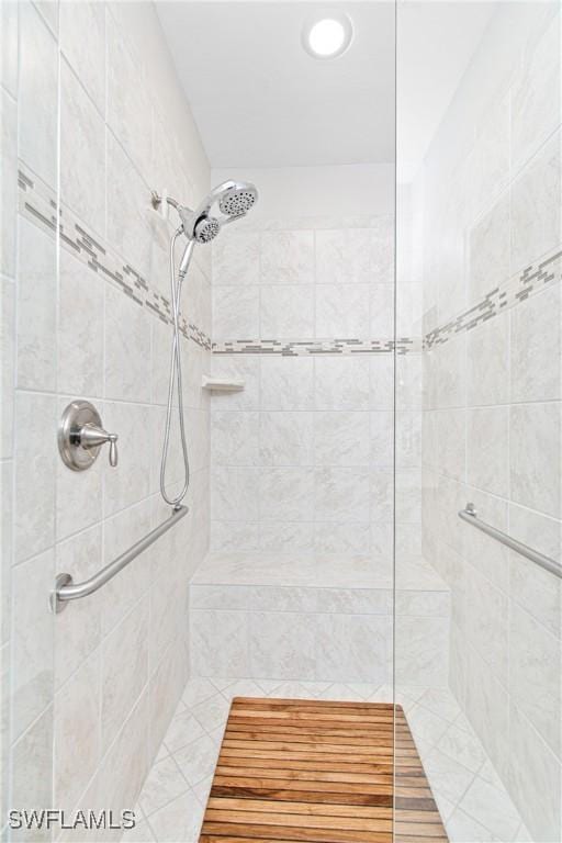 10736 Cetrella Dr, Fort Myers, FL 33913 - full bathroom featuring a tile shower