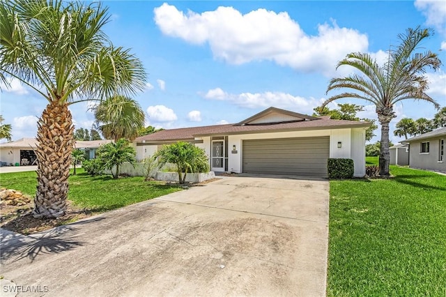 3823 Palm Tree Blvd, Cape Coral, FL 33904 - ranch-style home with an attached garage, a front yard, driveway, and stucco siding