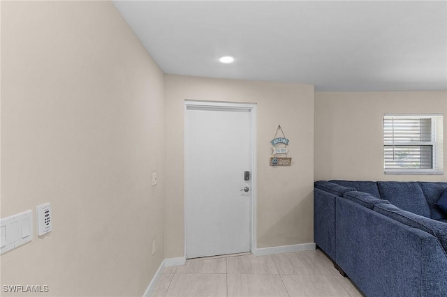 3823 Palm Tree Blvd, Cape Coral, FL 33904 - foyer featuring baseboards and light tile patterned floors