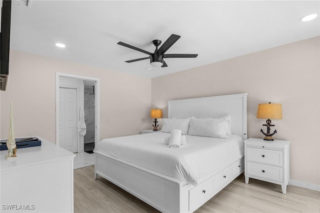 3823 Palm Tree Blvd, Cape Coral, FL 33904 - bedroom featuring light wood-type flooring, recessed lighting, ceiling fan, and ensuite bath