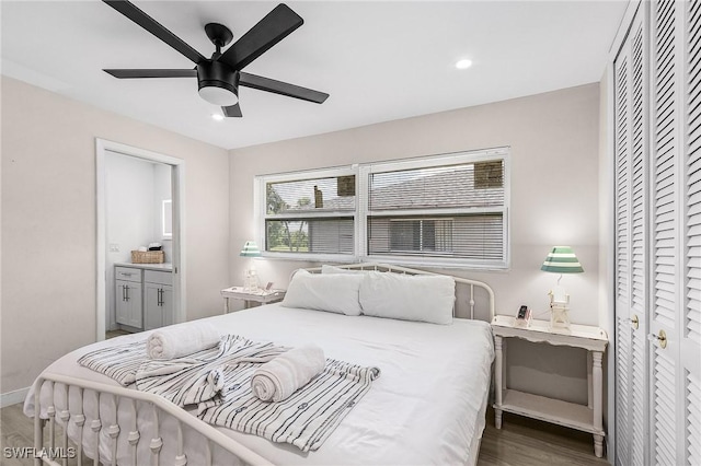 3823 Palm Tree Blvd, Cape Coral, FL 33904 - bedroom featuring wood finished floors, a closet, connected bathroom, recessed lighting, and ceiling fan