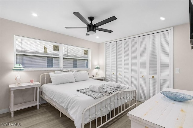 3823 Palm Tree Blvd, Cape Coral, FL 33904 - bedroom with light wood-style floors, a closet, recessed lighting, and ceiling fan