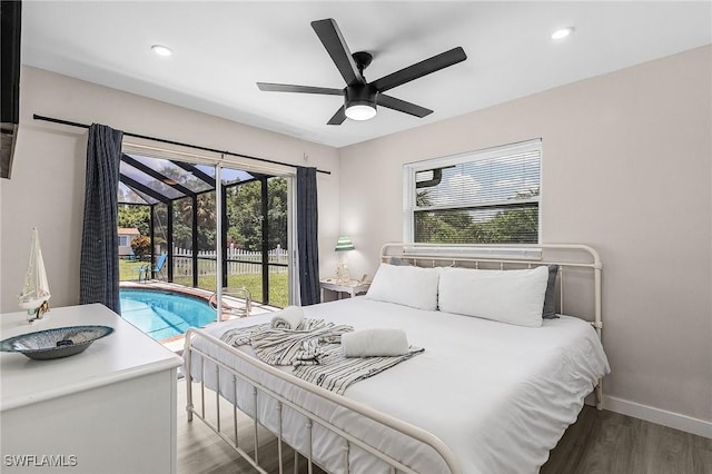 3823 Palm Tree Blvd, Cape Coral, FL 33904 - bedroom featuring a sunroom, wood finished floors, access to outside, ceiling fan, and recessed lighting
