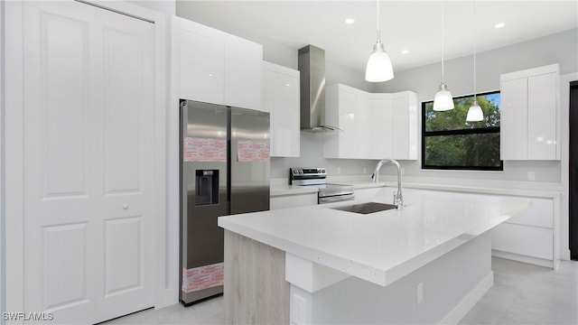 739 David Laird Ln, Lehigh Acres, FL 33974 - kitchen featuring wall chimney range hood, appliances with stainless steel finishes, modern cabinets, light countertops, and recessed lighting