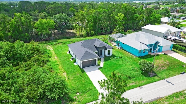 739 David Laird Ln, Lehigh Acres, FL 33974 - bird's eye view of a heavily wooded area