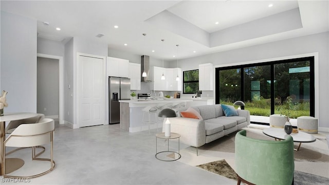 739 David Laird Ln, Lehigh Acres, FL 33974 - living room with recessed lighting and concrete floors