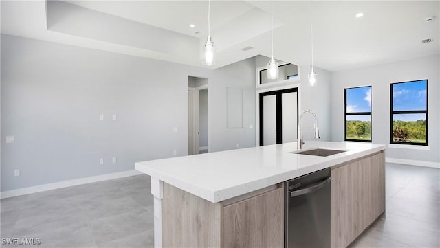 766 Naples Ave S, Lehigh Acres, FL 33974 - kitchen with modern cabinets, stainless steel dishwasher, light brown cabinetry, open floor plan, and an island with sink